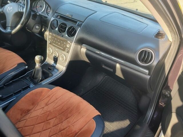 Чорний Мазда 6, об'ємом двигуна 1.8 л та пробігом 243 тис. км за 5300 $, фото 1 на Automoto.ua