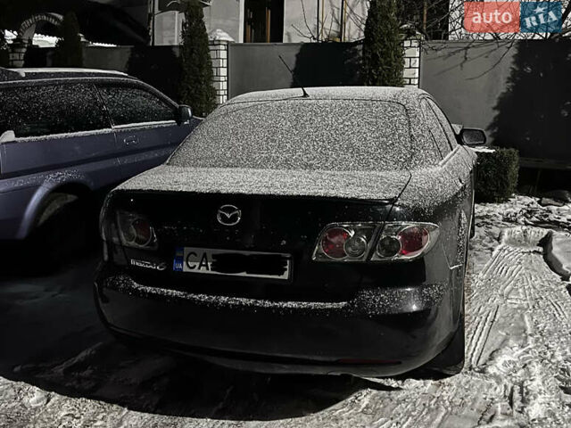 Чорний Мазда 6, об'ємом двигуна 1.8 л та пробігом 245 тис. км за 2500 $, фото 1 на Automoto.ua