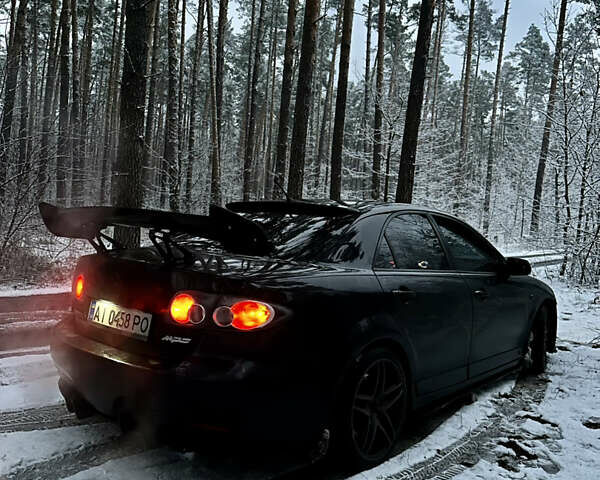 Чорний Мазда 6, об'ємом двигуна 2.3 л та пробігом 207 тис. км за 6400 $, фото 1 на Automoto.ua