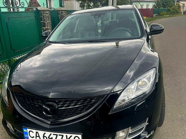 Черный Мазда 6, объемом двигателя 2.5 л и пробегом 260 тыс. км за 6500 $, фото 1 на Automoto.ua