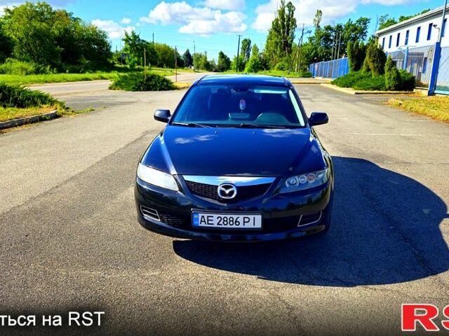Черный Мазда 6, объемом двигателя 2 л и пробегом 220 тыс. км за 6000 $, фото 1 на Automoto.ua