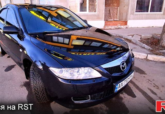Черный Мазда 6, объемом двигателя 2 л и пробегом 270 тыс. км за 6100 $, фото 1 на Automoto.ua