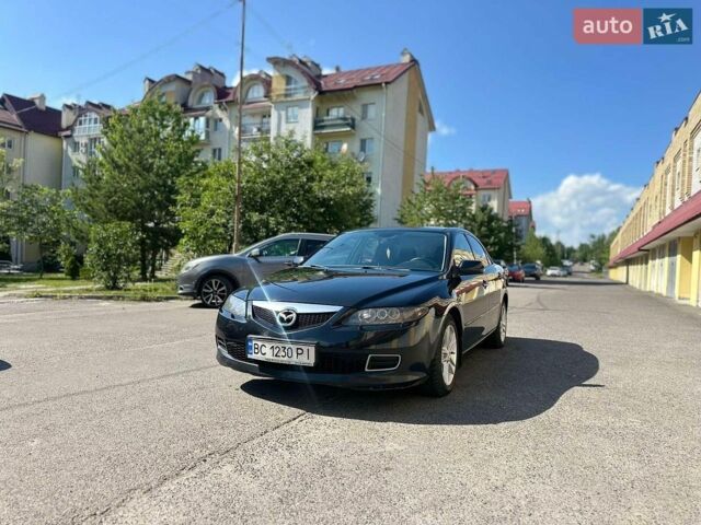 Черный Мазда 6, объемом двигателя 2 л и пробегом 330 тыс. км за 4650 $, фото 1 на Automoto.ua