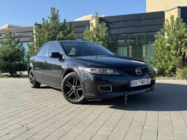 Черный Мазда 6, объемом двигателя 2 л и пробегом 180 тыс. км за 4500 $, фото 1 на Automoto.ua