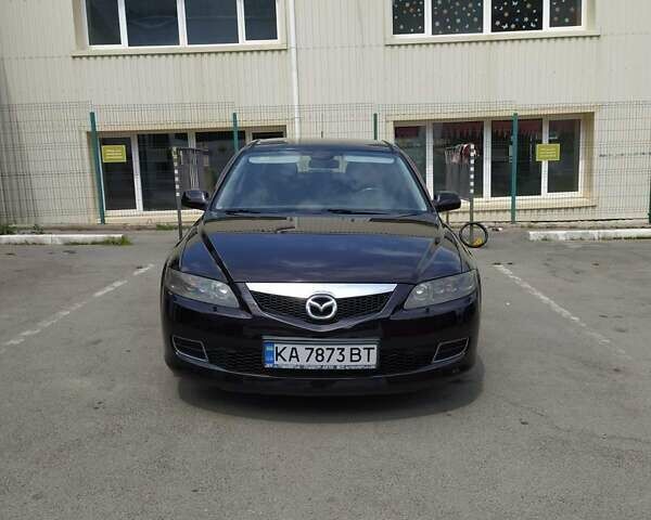Черный Мазда 6, объемом двигателя 2 л и пробегом 235 тыс. км за 5350 $, фото 1 на Automoto.ua