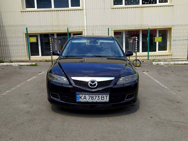 Черный Мазда 6, объемом двигателя 2 л и пробегом 235 тыс. км за 5350 $, фото 1 на Automoto.ua