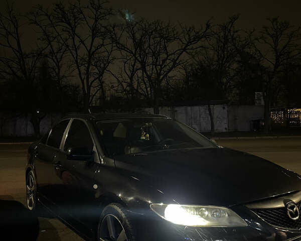 Черный Мазда 6, объемом двигателя 2.3 л и пробегом 150 тыс. км за 4700 $, фото 1 на Automoto.ua