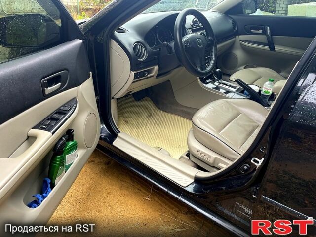 Черный Мазда 6, объемом двигателя 2 л и пробегом 289 тыс. км за 6200 $, фото 1 на Automoto.ua