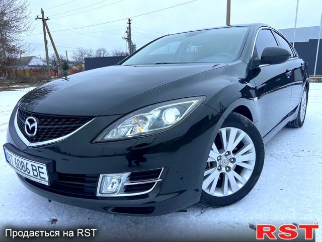 Черный Мазда 6, объемом двигателя 2 л и пробегом 1590 тыс. км за 6850 $, фото 1 на Automoto.ua
