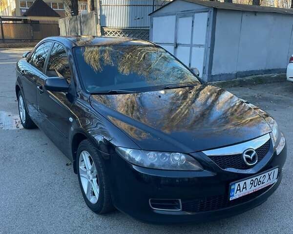 Черный Мазда 6, объемом двигателя 2 л и пробегом 315 тыс. км за 4700 $, фото 1 на Automoto.ua