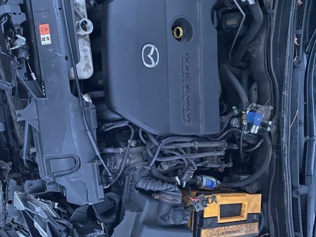 Черный Мазда 6, объемом двигателя 2 л и пробегом 220 тыс. км за 3700 $, фото 1 на Automoto.ua