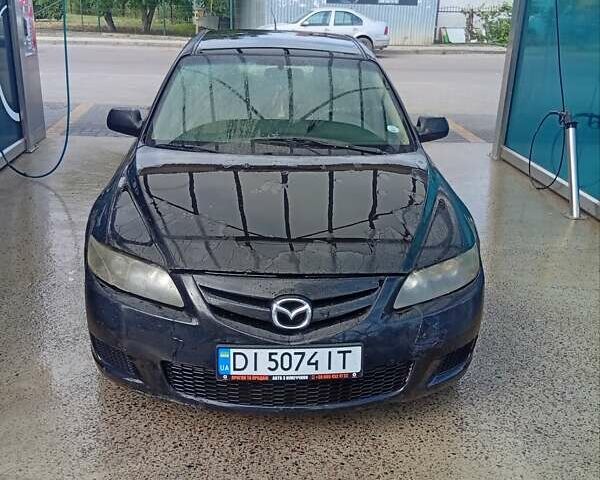 Черный Мазда 6, объемом двигателя 2.26 л и пробегом 198 тыс. км за 3700 $, фото 1 на Automoto.ua