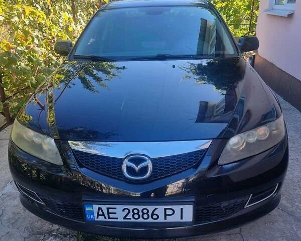 Черный Мазда 6, объемом двигателя 2 л и пробегом 215 тыс. км за 5500 $, фото 1 на Automoto.ua