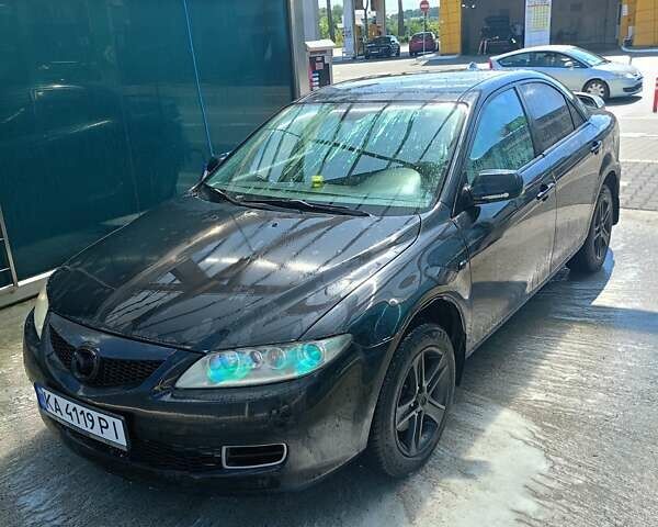 Черный Мазда 6, объемом двигателя 2 л и пробегом 280 тыс. км за 5000 $, фото 1 на Automoto.ua