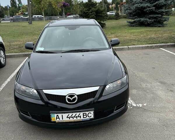 Черный Мазда 6, объемом двигателя 1.8 л и пробегом 134 тыс. км за 7500 $, фото 1 на Automoto.ua