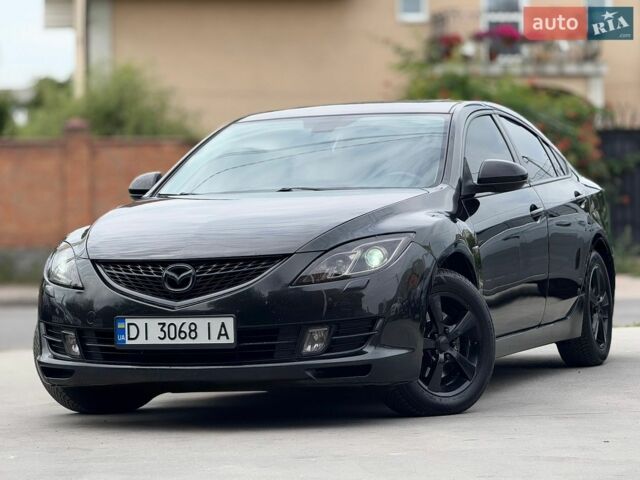 Черный Мазда 6, объемом двигателя 2 л и пробегом 300 тыс. км за 5999 $, фото 1 на Automoto.ua