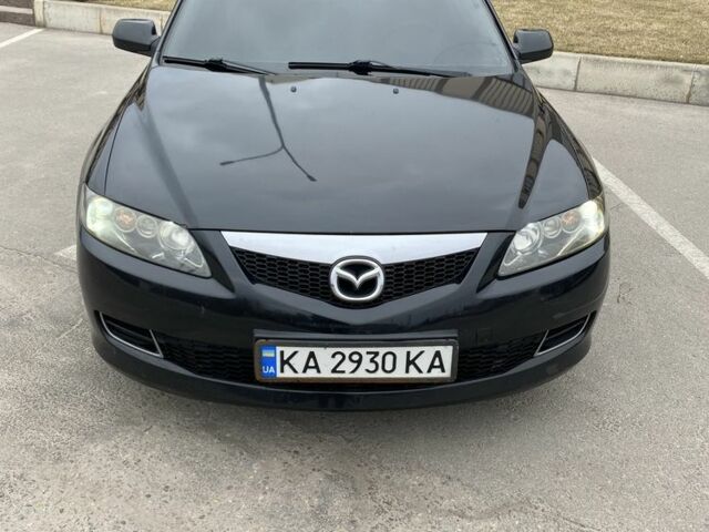 Черный Мазда 6, объемом двигателя 2 л и пробегом 243 тыс. км за 6000 $, фото 1 на Automoto.ua