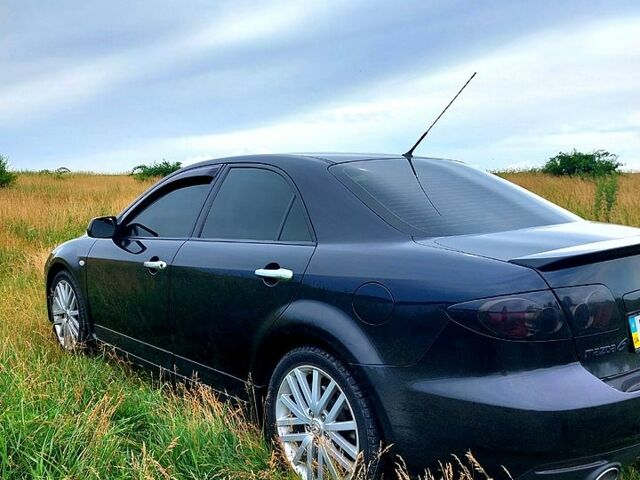 Чорний Мазда 6, об'ємом двигуна 2.3 л та пробігом 150 тис. км за 6500 $, фото 1 на Automoto.ua