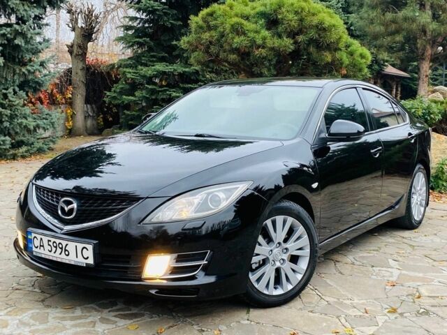 Черный Мазда 6, объемом двигателя 2 л и пробегом 266 тыс. км за 6600 $, фото 1 на Automoto.ua