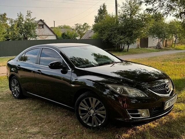 Черный Мазда 6, объемом двигателя 2 л и пробегом 99 тыс. км за 7300 $, фото 1 на Automoto.ua
