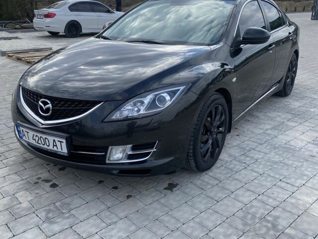 Черный Мазда 6, объемом двигателя 2.5 л и пробегом 227 тыс. км за 6300 $, фото 1 на Automoto.ua