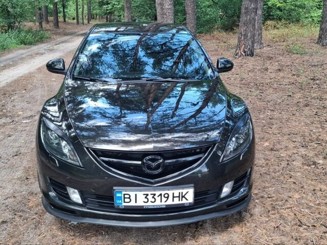 Черный Мазда 6, объемом двигателя 2.49 л и пробегом 163 тыс. км за 8300 $, фото 1 на Automoto.ua