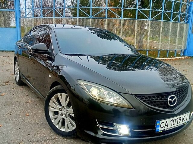 Черный Мазда 6, объемом двигателя 2 л и пробегом 300 тыс. км за 5900 $, фото 1 на Automoto.ua