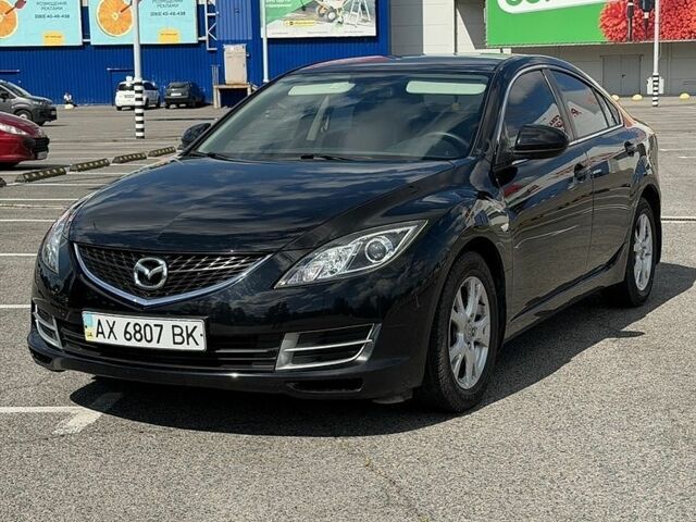 Черный Мазда 6, объемом двигателя 1.8 л и пробегом 90 тыс. км за 7100 $, фото 1 на Automoto.ua