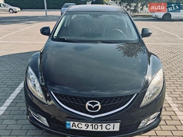 Черный Мазда 6, объемом двигателя 2 л и пробегом 209 тыс. км за 6500 $, фото 1 на Automoto.ua