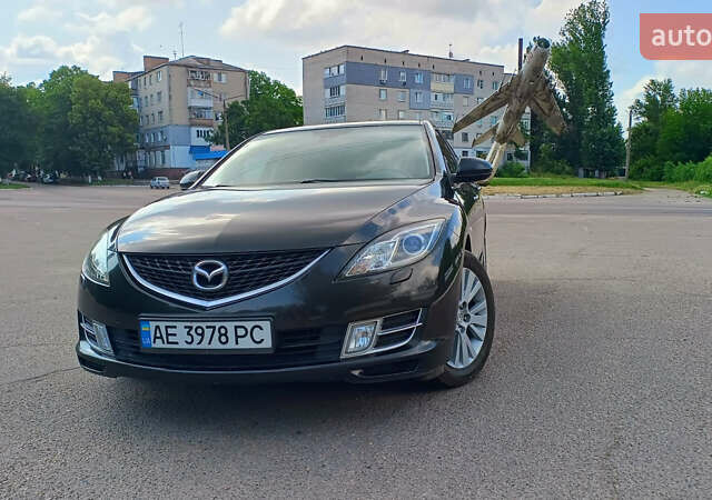 Черный Мазда 6, объемом двигателя 2 л и пробегом 211 тыс. км за 7850 $, фото 1 на Automoto.ua