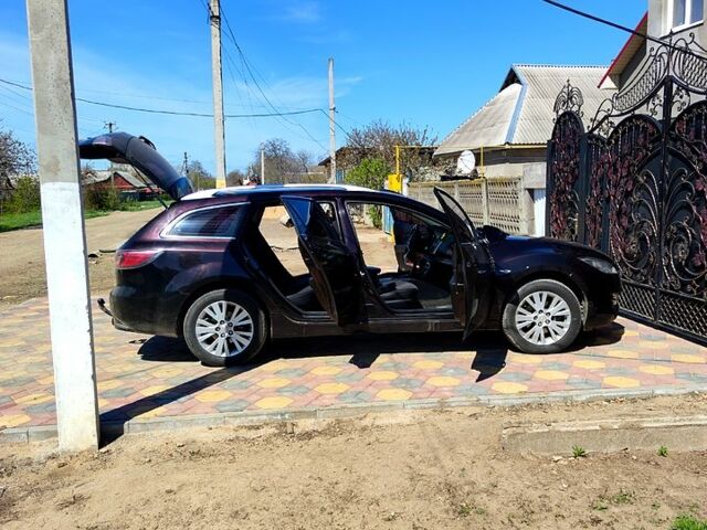 Черный Мазда 6, объемом двигателя 2 л и пробегом 225 тыс. км за 7000 $, фото 1 на Automoto.ua