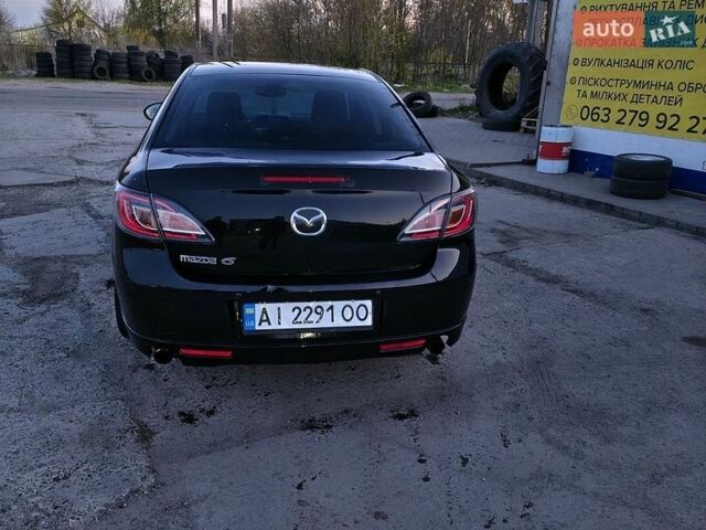 Черный Мазда 6, объемом двигателя 2 л и пробегом 300 тыс. км за 6200 $, фото 1 на Automoto.ua