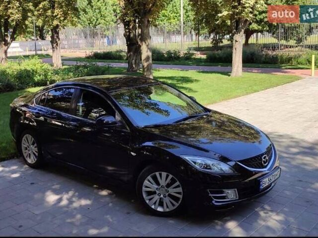 Черный Мазда 6, объемом двигателя 1.8 л и пробегом 70 тыс. км за 9300 $, фото 1 на Automoto.ua