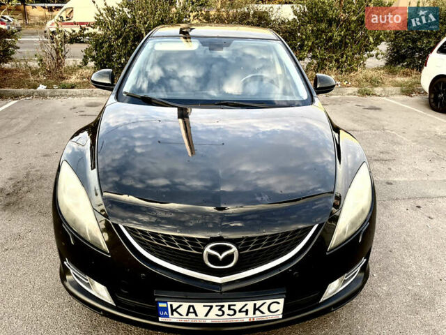 Черный Мазда 6, объемом двигателя 2 л и пробегом 248 тыс. км за 6800 $, фото 1 на Automoto.ua