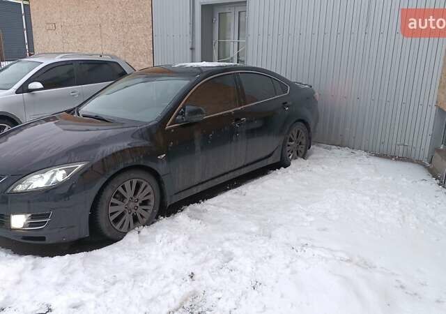Черный Мазда 6, объемом двигателя 2 л и пробегом 210 тыс. км за 7900 $, фото 1 на Automoto.ua