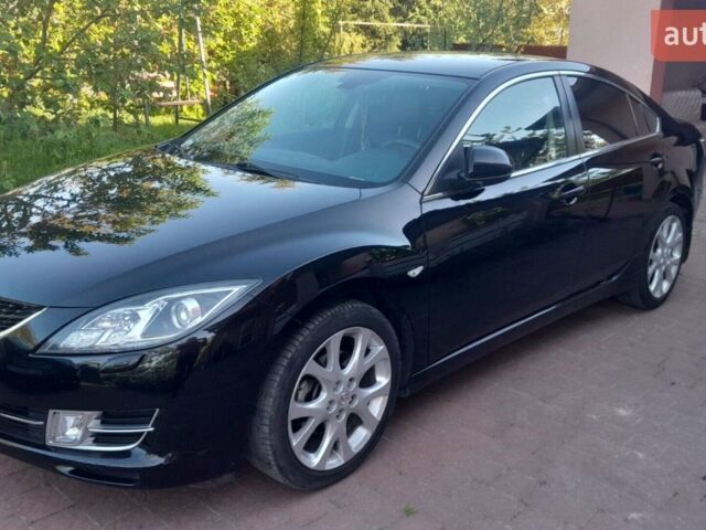Черный Мазда 6, объемом двигателя 2.49 л и пробегом 170 тыс. км за 7700 $, фото 1 на Automoto.ua