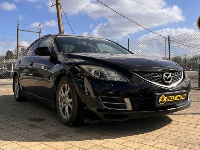 Черный Мазда 6, объемом двигателя 1.8 л и пробегом 157 тыс. км за 6500 $, фото 1 на Automoto.ua