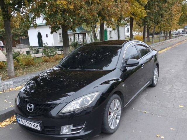 Черный Мазда 6, объемом двигателя 2 л и пробегом 314 тыс. км за 6950 $, фото 1 на Automoto.ua