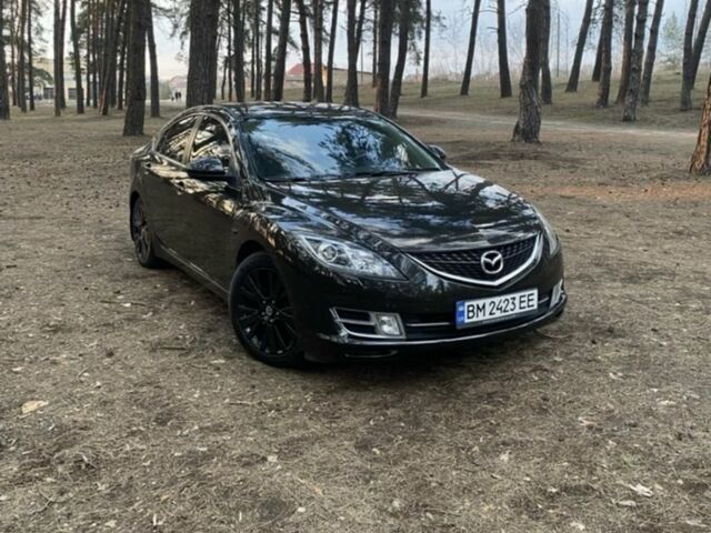 Черный Мазда 6, объемом двигателя 2 л и пробегом 239 тыс. км за 7097 $, фото 1 на Automoto.ua