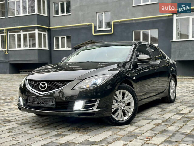 Черный Мазда 6, объемом двигателя 2 л и пробегом 253 тыс. км за 6500 $, фото 1 на Automoto.ua