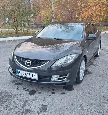 Черный Мазда 6, объемом двигателя 2 л и пробегом 160 тыс. км за 6800 $, фото 1 на Automoto.ua