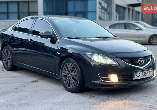 Черный Мазда 6, объемом двигателя 2 л и пробегом 240 тыс. км за 6650 $, фото 1 на Automoto.ua