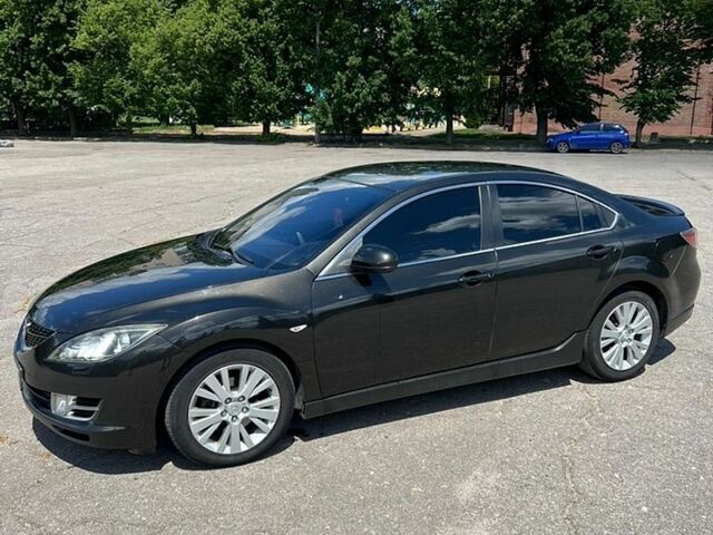 Черный Мазда 6, объемом двигателя 2 л и пробегом 290 тыс. км за 6050 $, фото 1 на Automoto.ua