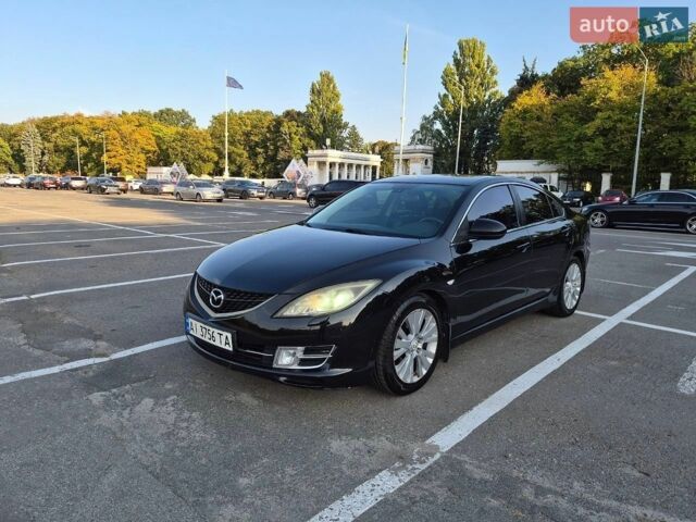 Черный Мазда 6, объемом двигателя 2 л и пробегом 234 тыс. км за 6400 $, фото 1 на Automoto.ua