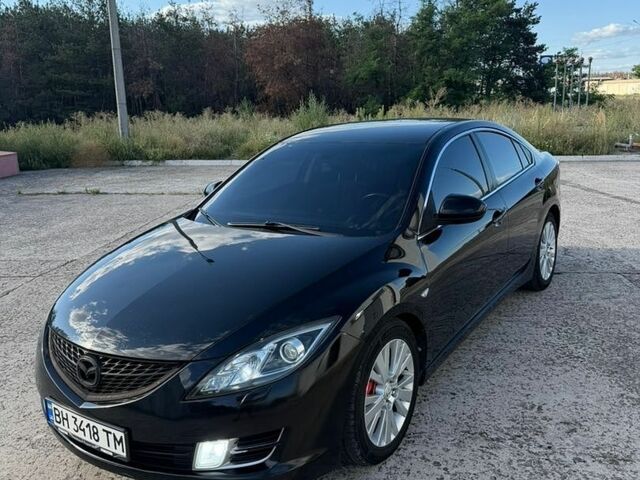 Черный Мазда 6, объемом двигателя 2 л и пробегом 220 тыс. км за 6999 $, фото 1 на Automoto.ua