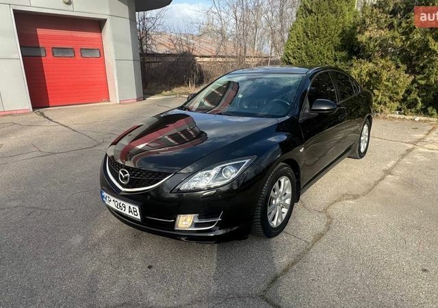 Черный Мазда 6, объемом двигателя 2.49 л и пробегом 296 тыс. км за 5700 $, фото 1 на Automoto.ua