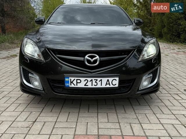 Черный Мазда 6, объемом двигателя 2.5 л и пробегом 244 тыс. км за 7100 $, фото 1 на Automoto.ua