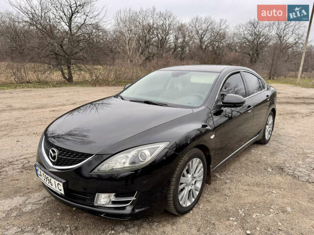 Черный Мазда 6, объемом двигателя 2 л и пробегом 258 тыс. км за 6900 $, фото 1 на Automoto.ua