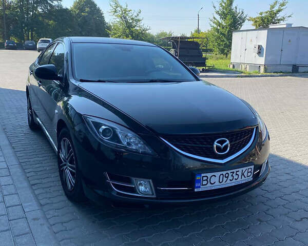Черный Мазда 6, объемом двигателя 2 л и пробегом 281 тыс. км за 6600 $, фото 1 на Automoto.ua