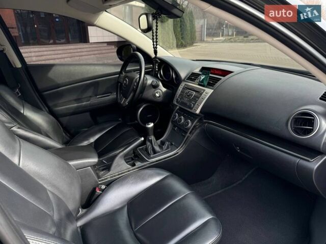 Черный Мазда 6, объемом двигателя 2.5 л и пробегом 210 тыс. км за 9499 $, фото 1 на Automoto.ua